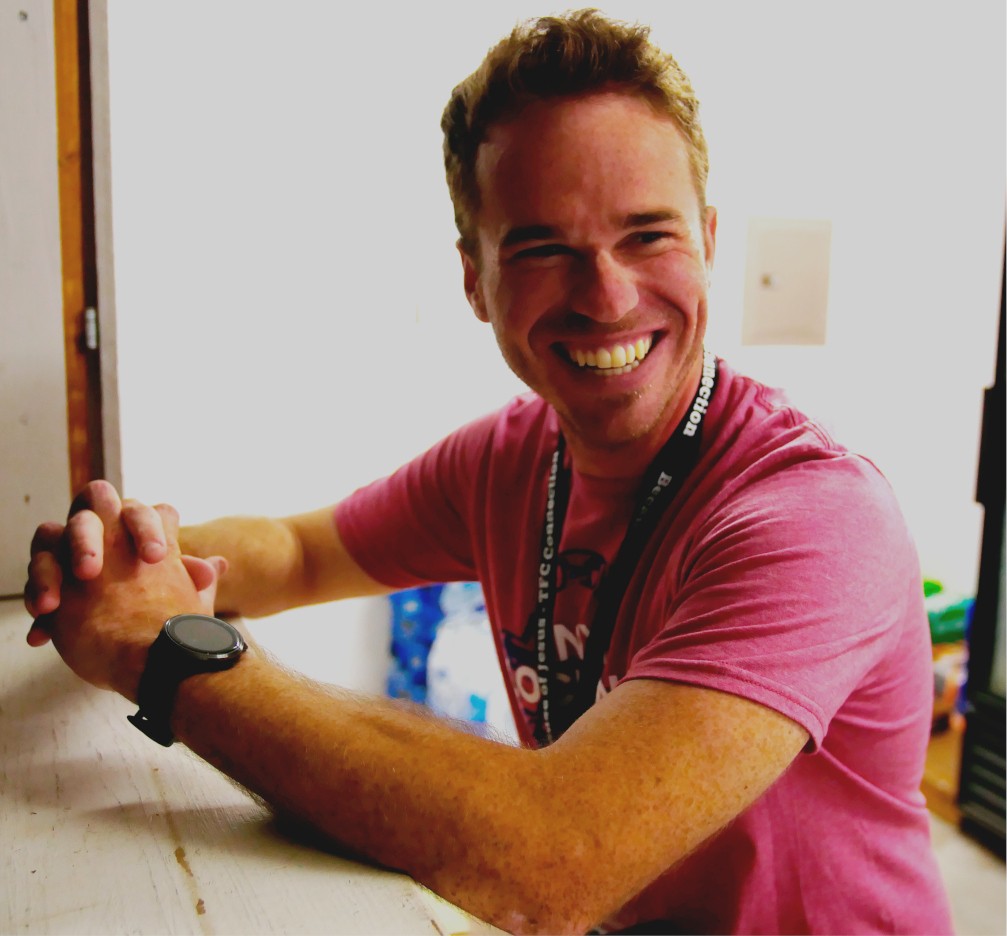 An alumni volunteering at Camp alumni